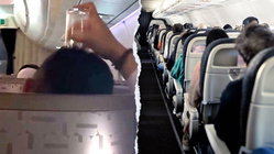 Passenger's bizarre use of drinking glass on flight leaves travelers horrified Education Melbourne